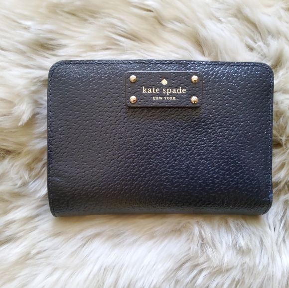 kate spade Handbags - Authentic EUC Kate Spade Bi fold wallet in EUC  Dark Navy Blue